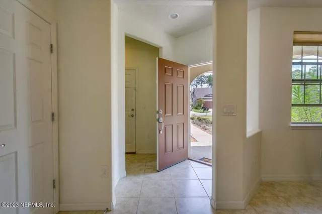 a view of a dining room that has a table and chairs