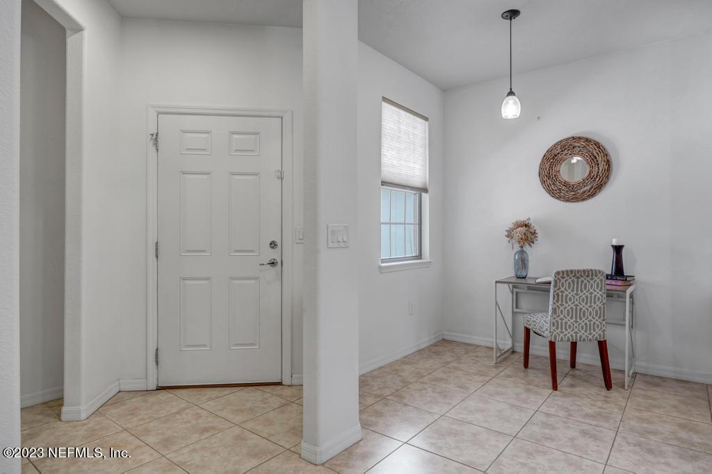 265 Caspia Lane Ponte Vedra, FL 32081 - Photo 8 of 86 a view of a dining room that has a table and chairs