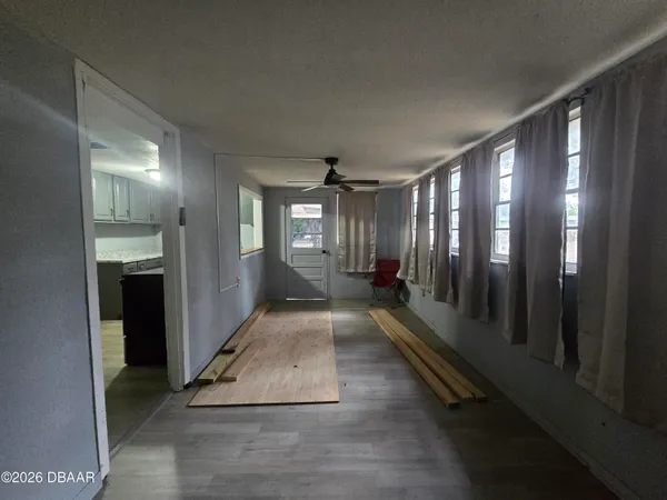 a view of gallery with windows