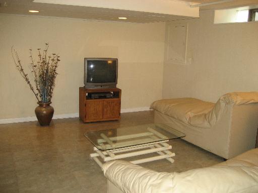 309 Uvedale Road Riverside, IL 60546 - Photo 12 of 15 a bedroom with a bed and a couch