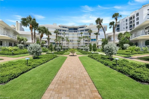 a view of street with a building in the background