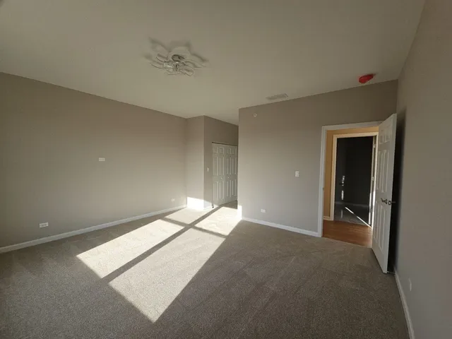an empty room with a natural light