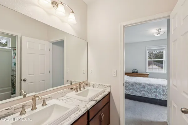 a bathroom with a shower and a toilet