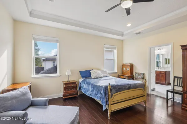 a bedroom with a bed and furniture