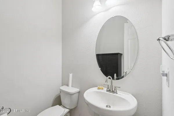 a living room with furniture and windows