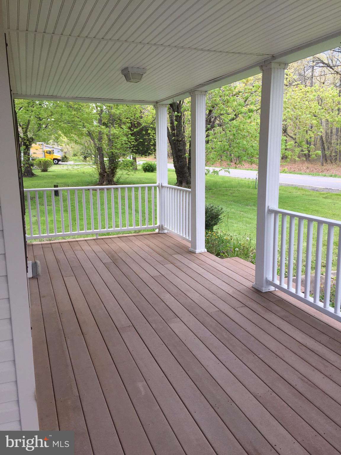 1401 Cox Neck Road Chester, MD 21619 - Photo 26 of 32 Porch is Composite decking and vinyl railings.