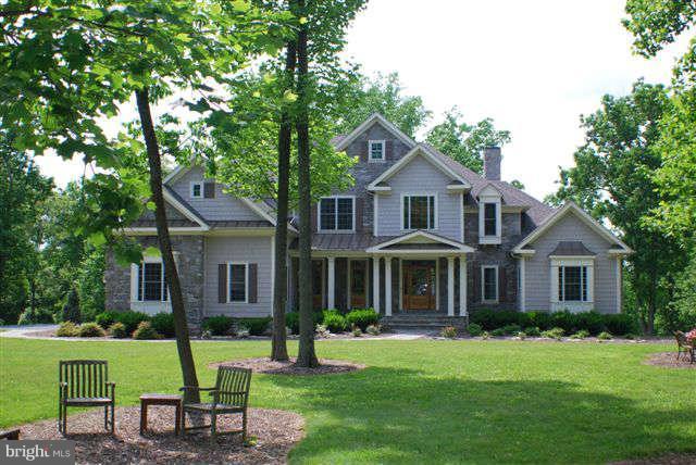 4444 Teen Barnes Road Jefferson, MD 21755 - Photo 1 of 30 a front view of a house with a garden and porch