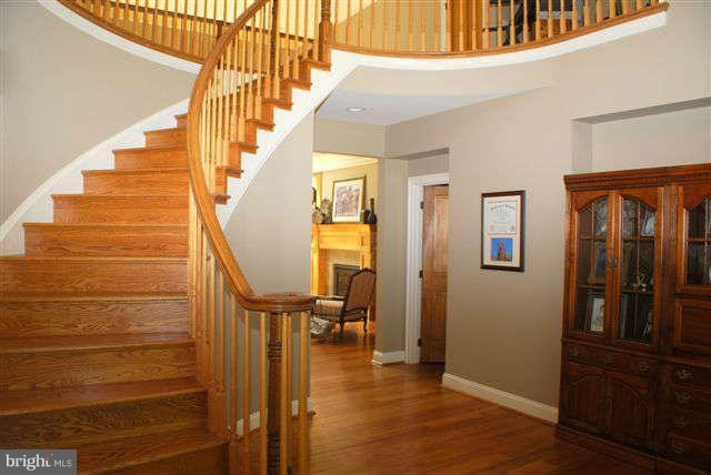 4444 Teen Barnes Road Jefferson, MD 21755 - Photo 3 of 30 a view of entryway with wooden floor and stairs
