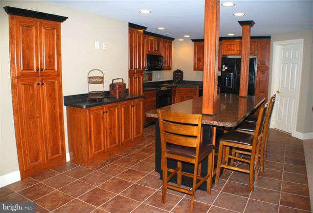 4444 Teen Barnes Road Jefferson, MD 21755 - Photo 22 of 30 a dining hall with stainless steel appliances a stove a sink and dishwasher