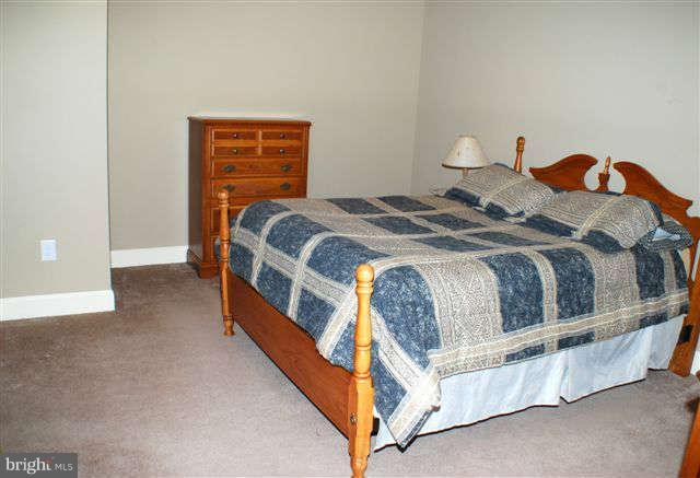 4444 Teen Barnes Road Jefferson, MD 21755 - Photo 26 of 30 a bedroom with a bed and a window