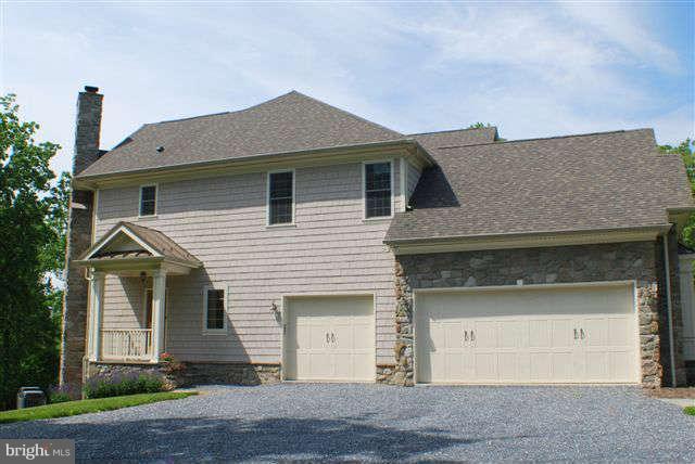4444 Teen Barnes Road Jefferson, MD 21755 - Photo 30 of 30 a front view of a house with a yard and garage