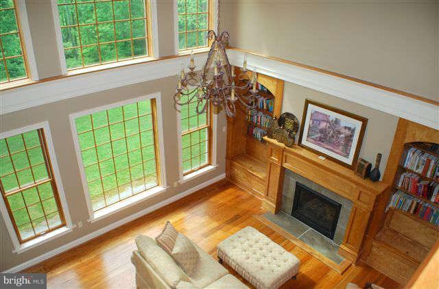 4444 Teen Barnes Road Jefferson, MD 21755 - Photo 5 of 30 a living room with furniture and a fireplace