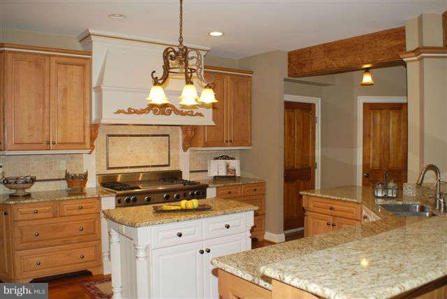 4444 Teen Barnes Road Jefferson, MD 21755 - Photo 7 of 30 a kitchen with stainless steel appliances a stove sink and cabinets