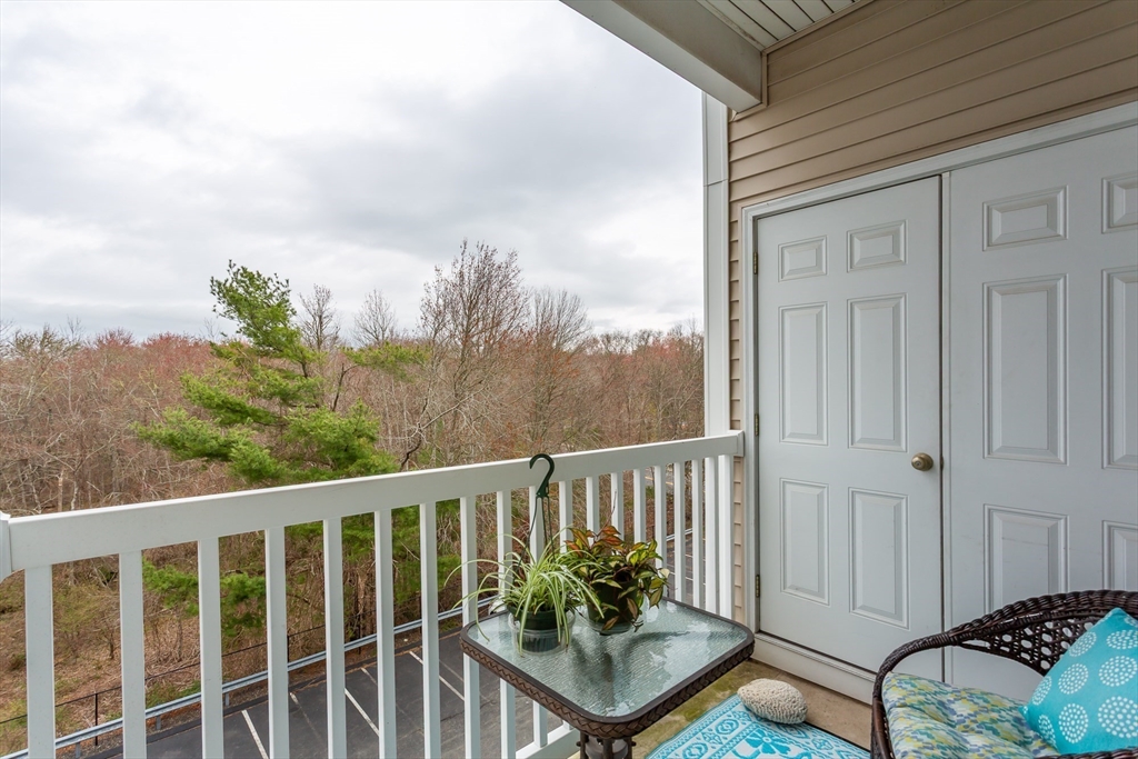 1481 Phillips Road, Unit 1305 New Bedford, MA 02745 - Photo 25 of 34 a view of a balcony with chairs