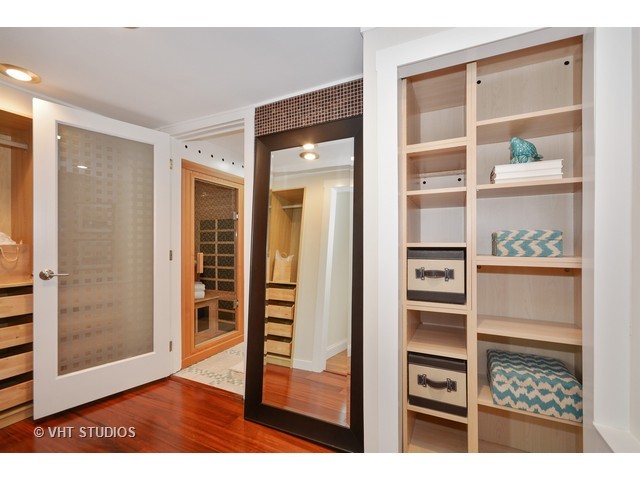 306 Spring Avenue Naperville, IL 60540 - Photo 17 of 25 a view of closet with wooden floor