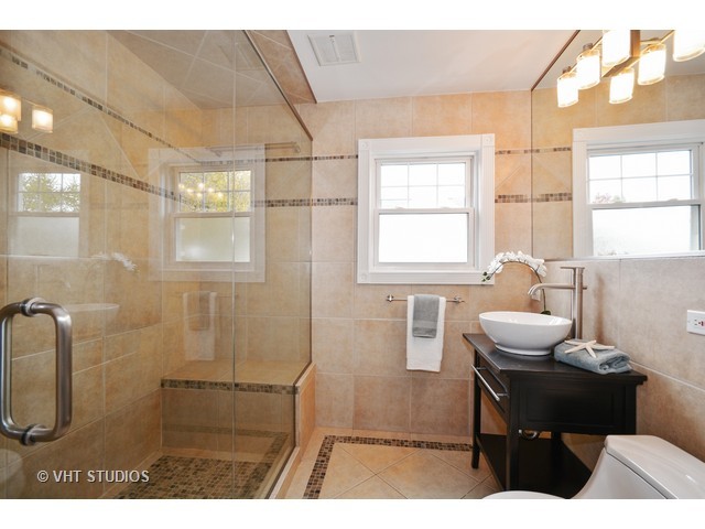 306 Spring Avenue Naperville, IL 60540 - Photo 21 of 25 a living room with furniture and a window