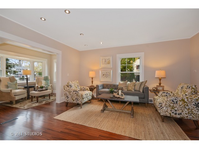 306 Spring Avenue Naperville, IL 60540 - Photo 8 of 25 a living room with furniture and wooden floor