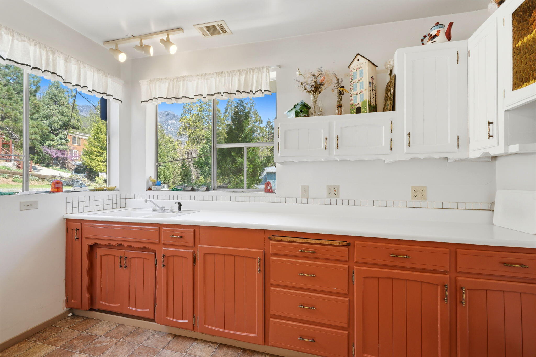 697 Loop Drive Springville, CA 93265 - Photo 21 of 55 a kitchen with stainless steel appliances granite countertop a sink a stove and cabinets