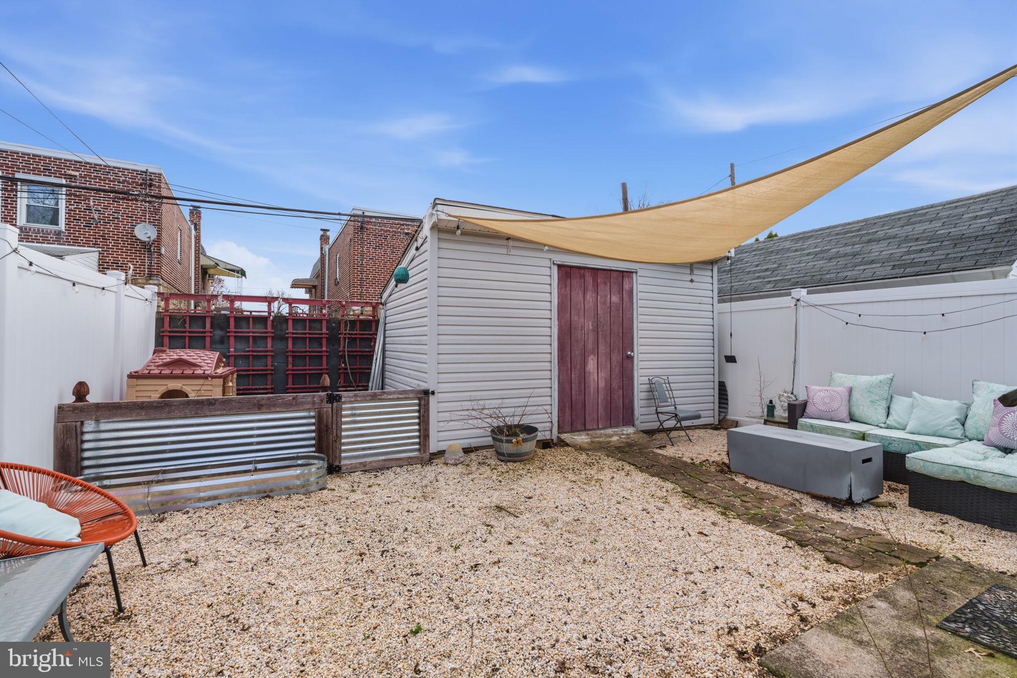 729 Chandler Street Philadelphia, PA 19111 - Photo 22 of 32 Fenced in private backyard with awning