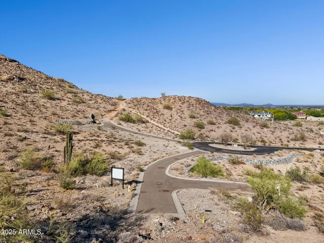 a view of a house with backyard porch and sitting area