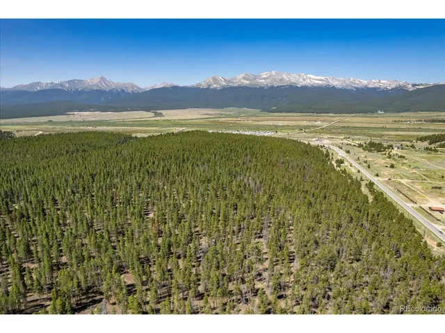 a view of an ocean and a mountain