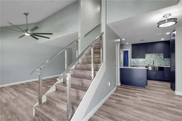 a view of entryway and kitchen