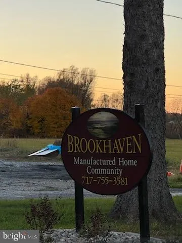 a view of outdoor space with sign board