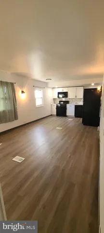 a view of a kitchen with a sink