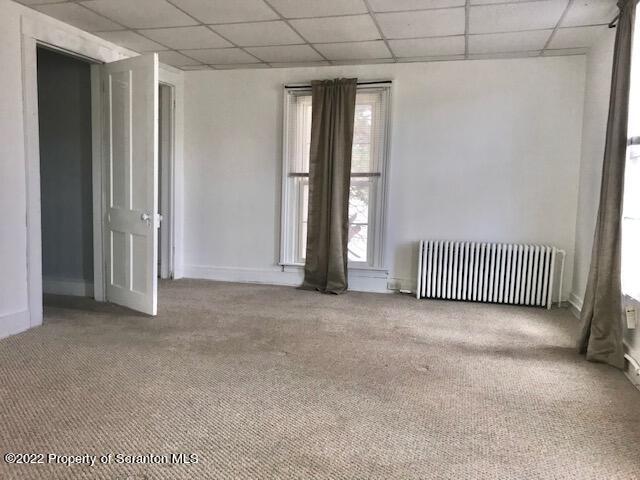 214 Main Street Moosic, PA 18507 - Photo 16 of 19 an empty room with windows