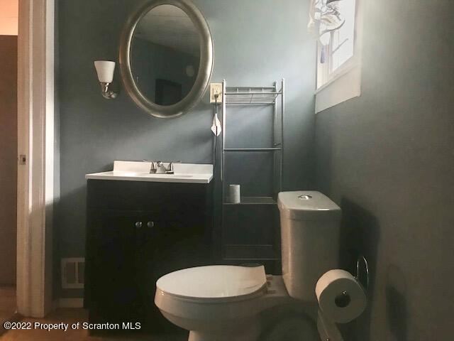 214 Main Street Moosic, PA 18507 - Photo 6 of 19 a bathroom with a toilet and a sink