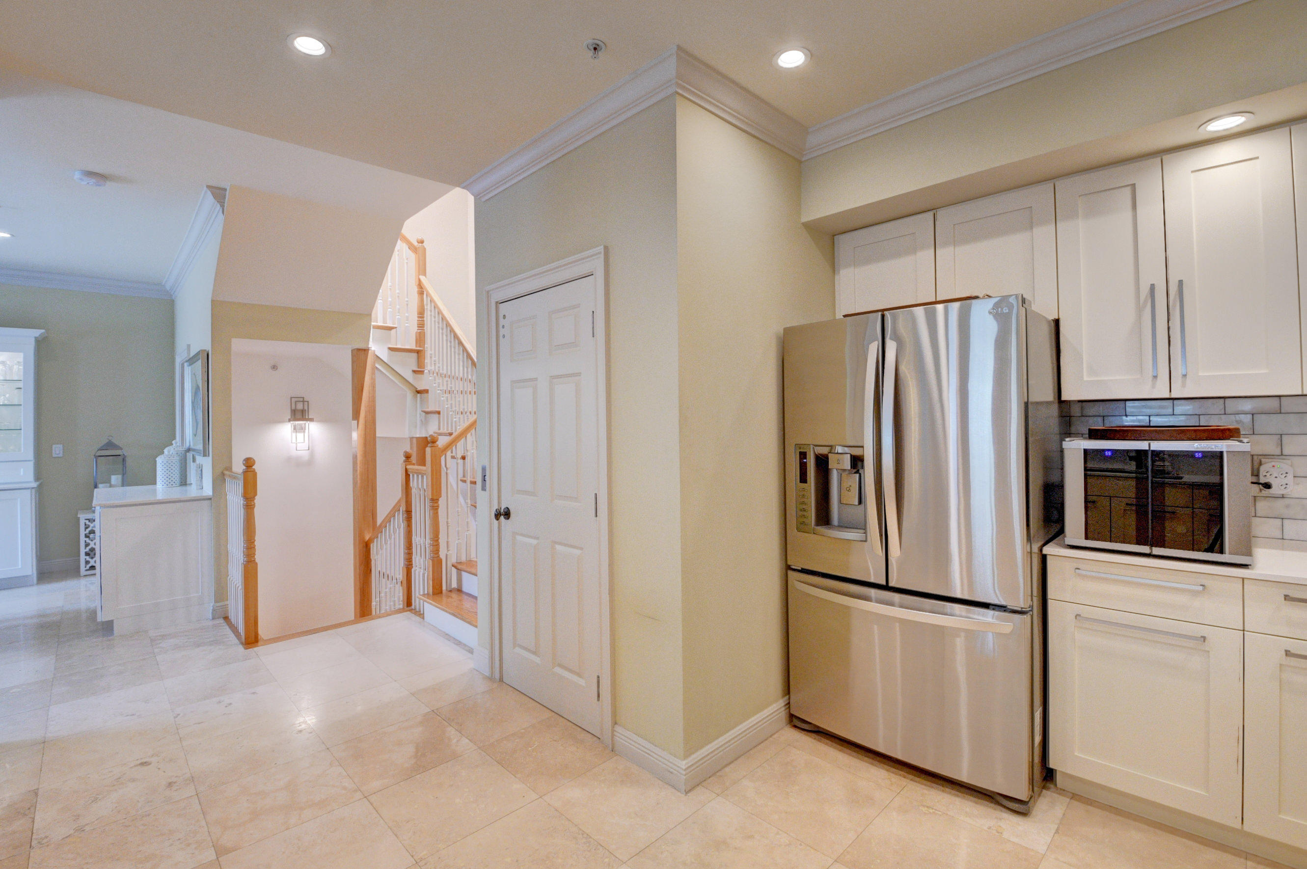 492 East Boca Raton Road Boca Raton, FL 33432 - Photo 19 of 44 a kitchen with stainless steel appliances a refrigerator and a stove