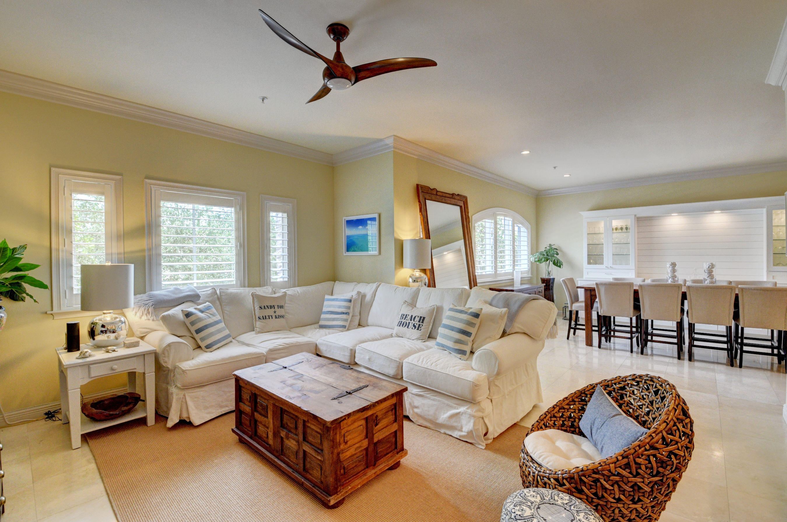 492 East Boca Raton Road Boca Raton, FL 33432 - Photo 2 of 44 a living room with furniture a rug and a large window