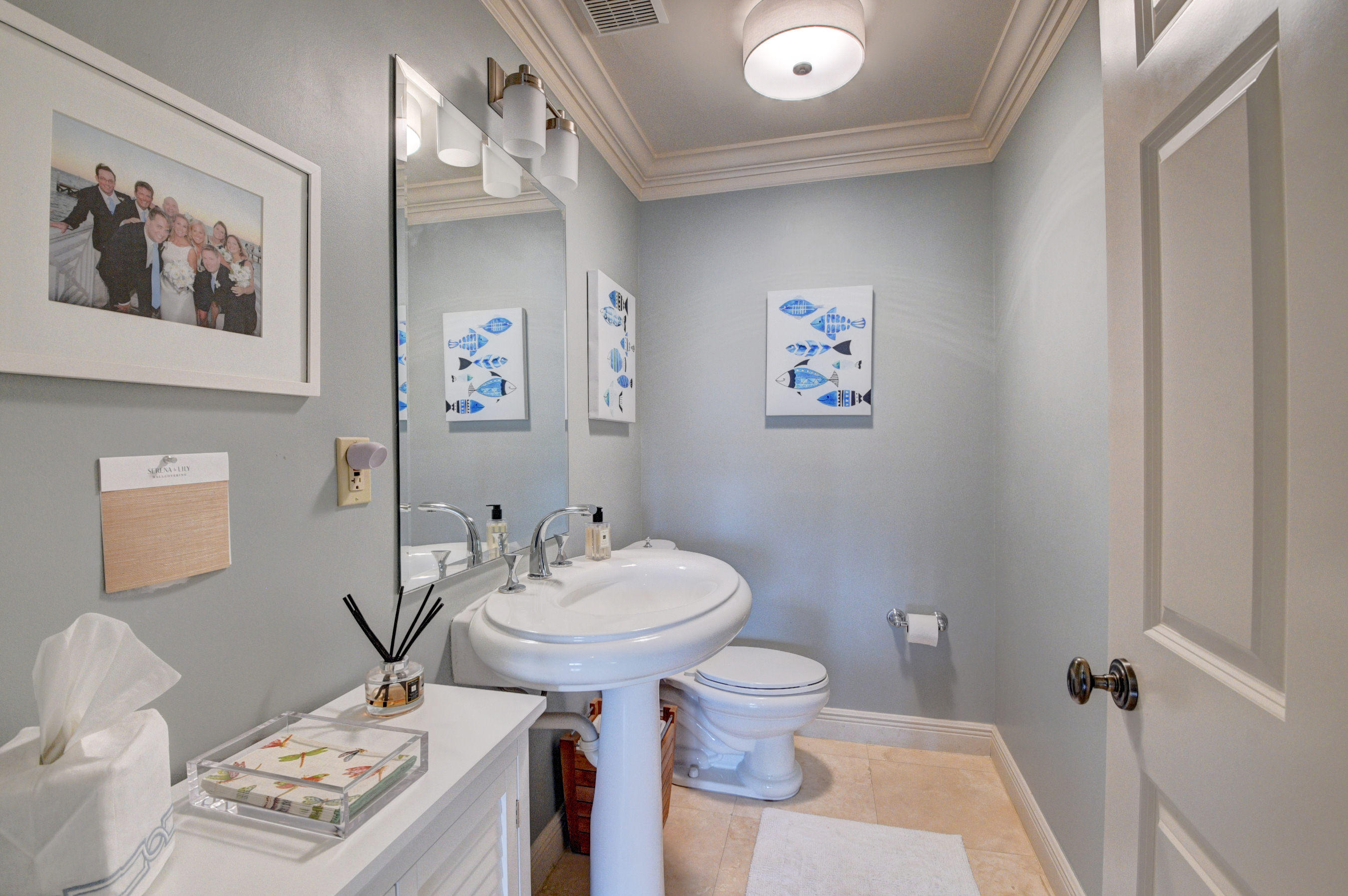 492 East Boca Raton Road Boca Raton, FL 33432 - Photo 22 of 44 a bathroom with a sink a toilet and mirror