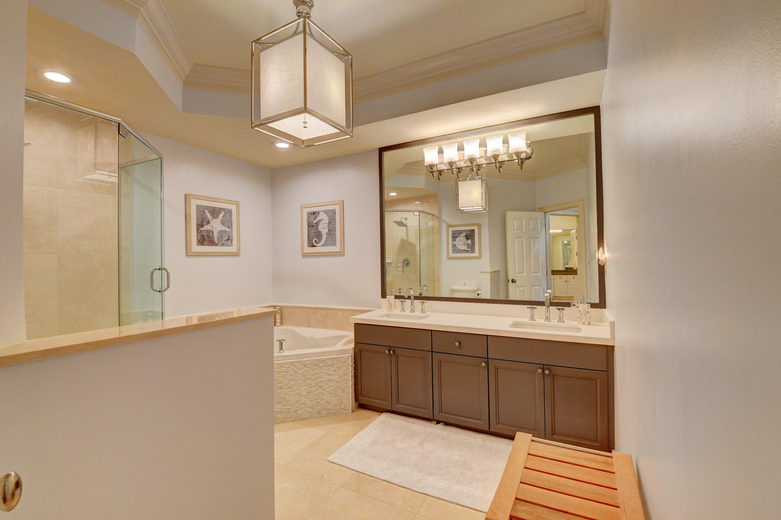 492 East Boca Raton Road Boca Raton, FL 33432 - Photo 27 of 44 a view of a bathroom with dual sinks