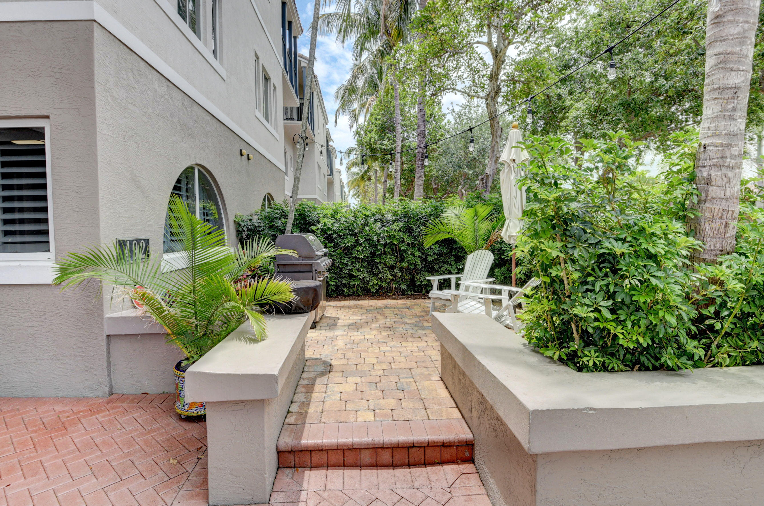 492 East Boca Raton Road Boca Raton, FL 33432 - Photo 3 of 44 a view of a garden with plants