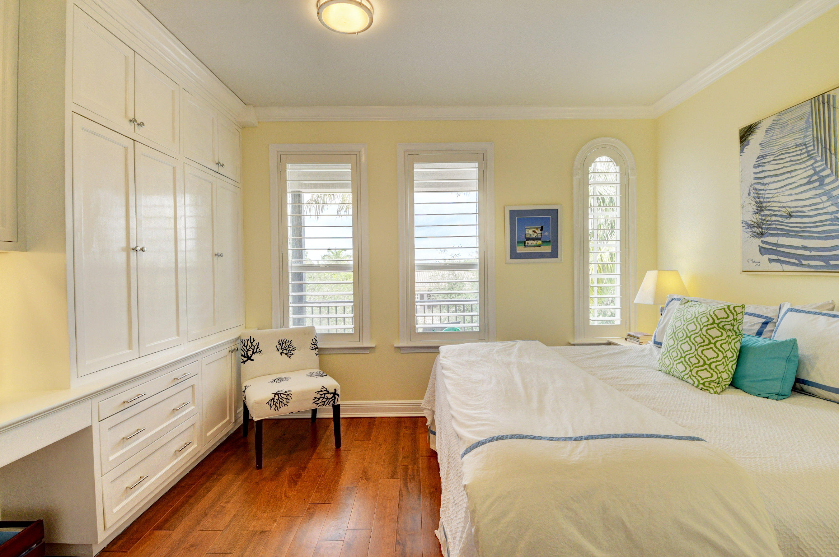 492 East Boca Raton Road Boca Raton, FL 33432 - Photo 31 of 44 a bedroom with a bed and a window