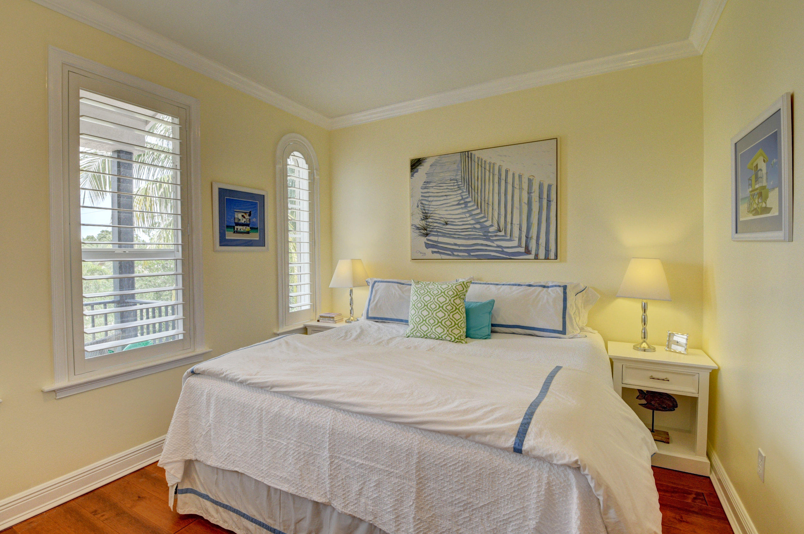 492 East Boca Raton Road Boca Raton, FL 33432 - Photo 32 of 44 a bedroom with a bed and a window