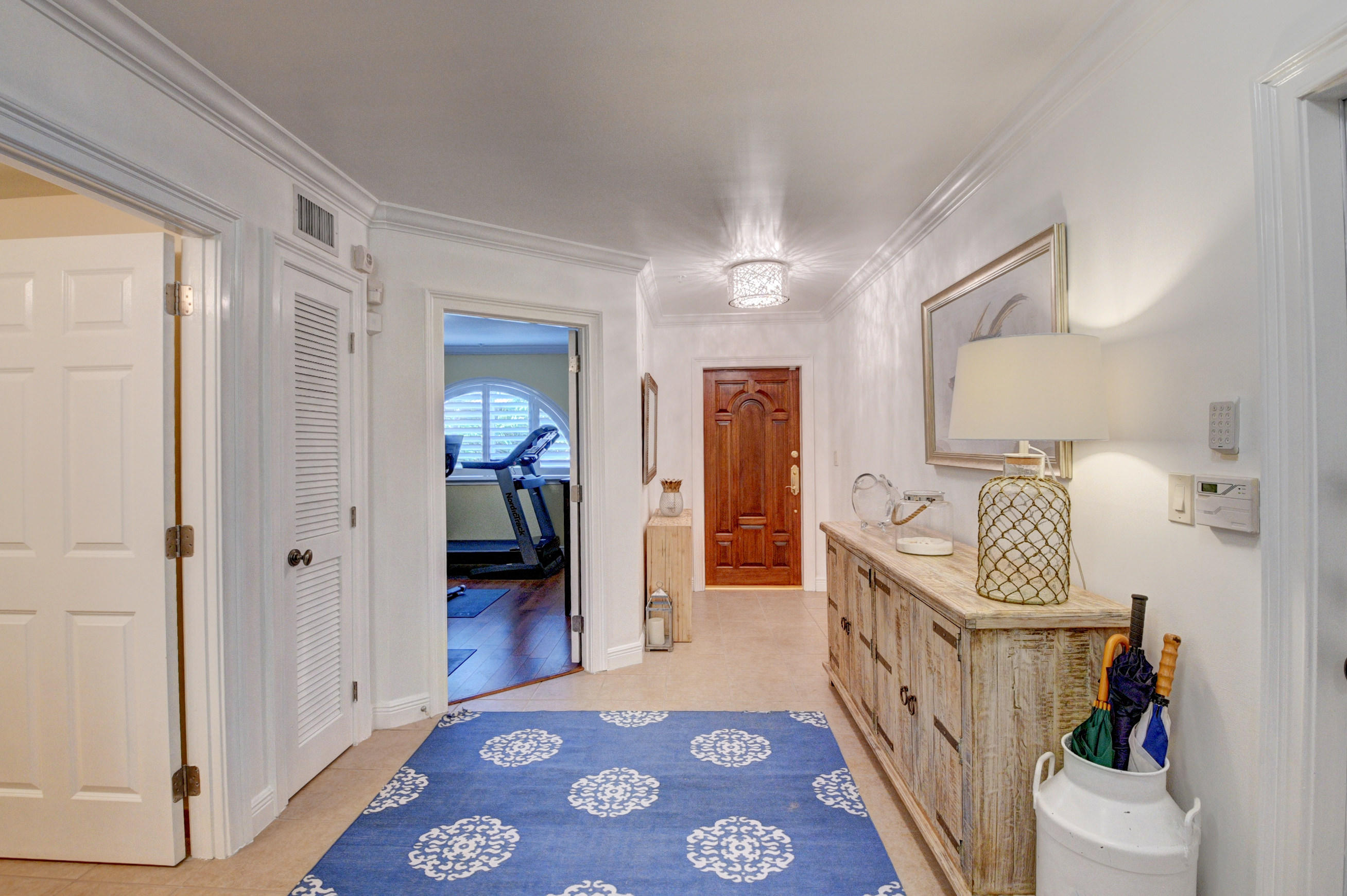 492 East Boca Raton Road Boca Raton, FL 33432 - Photo 4 of 44 a bedroom with furniture and wooden floor