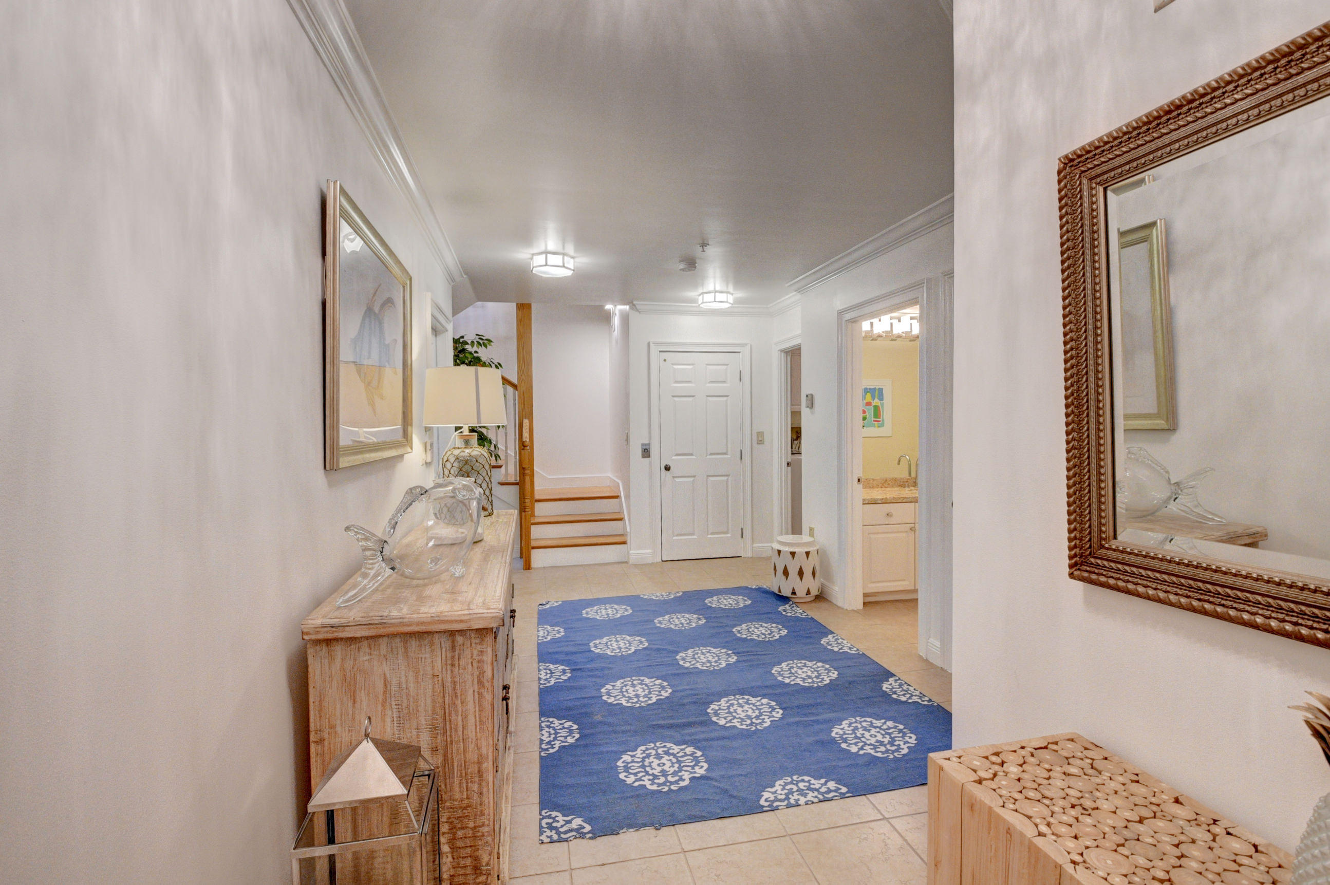 492 East Boca Raton Road Boca Raton, FL 33432 - Photo 5 of 44 a bathroom with a sink and a mirror