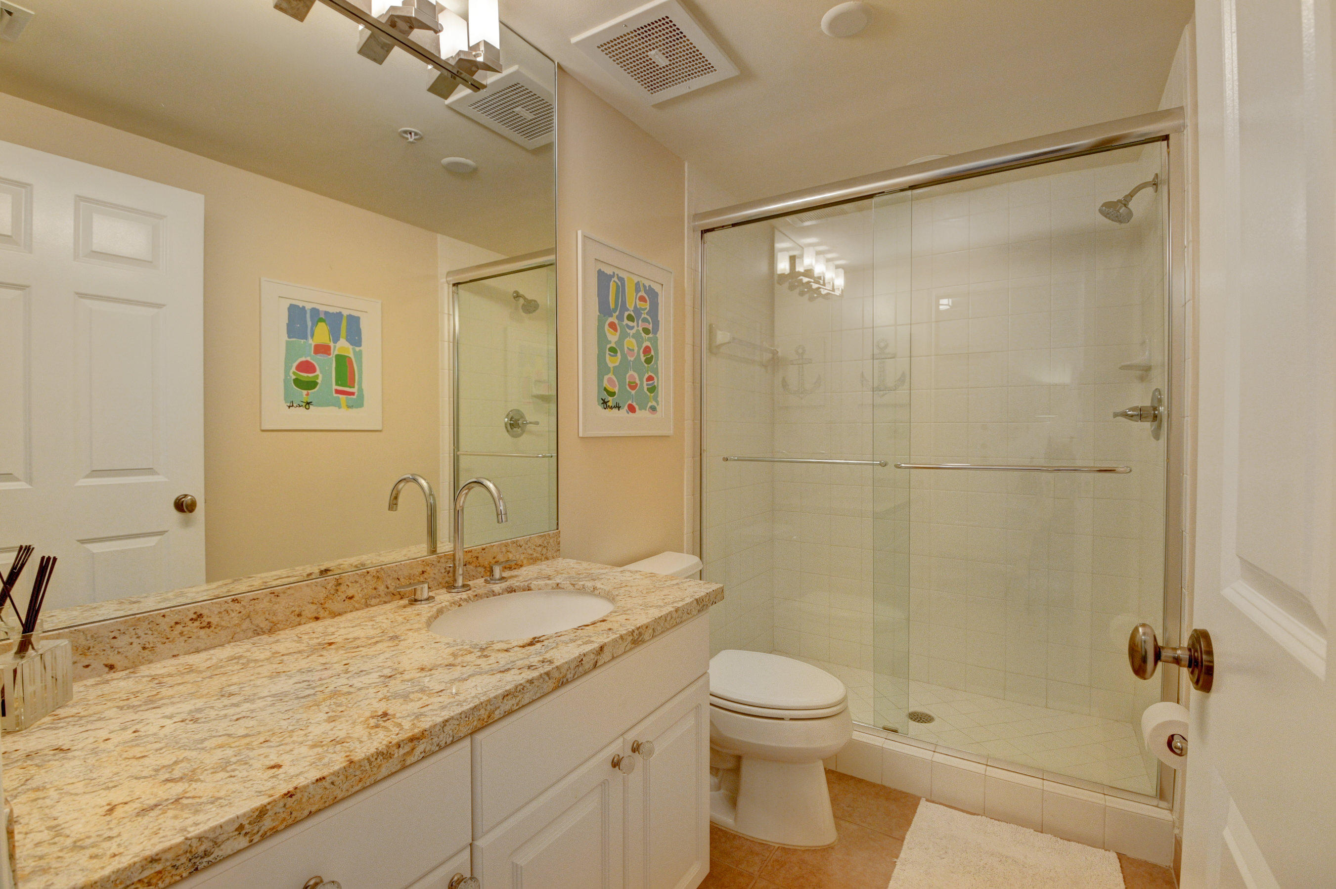 492 East Boca Raton Road Boca Raton, FL 33432 - Photo 7 of 44 a bathroom with a granite countertop sink toilet and shower