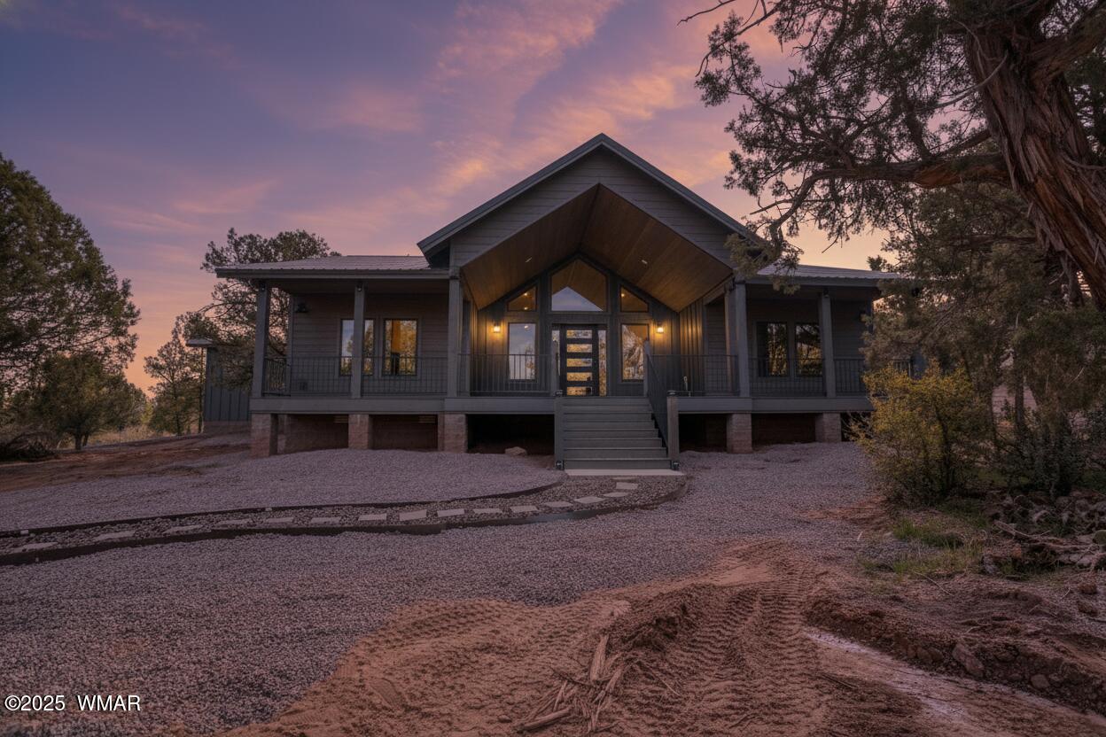 957 Cheney Ranch Loop Show Low, AZ 85901 - Photo 13 of 33 Twilight view of front