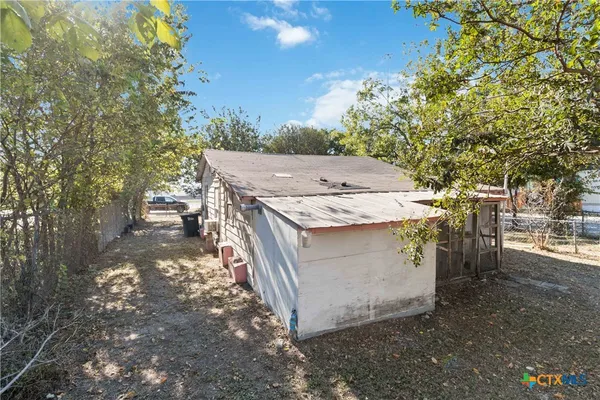 a view of a hall with an outdoor space