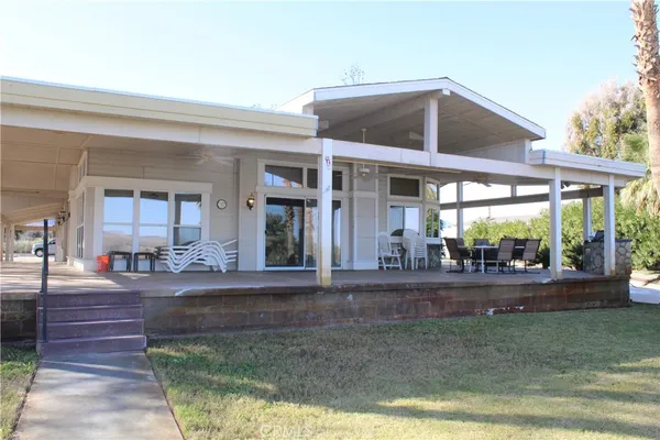 a view of a house with sitting area