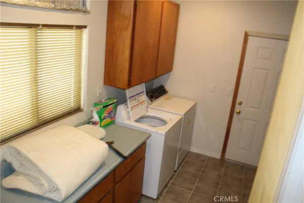 a bathroom with a sink and a window