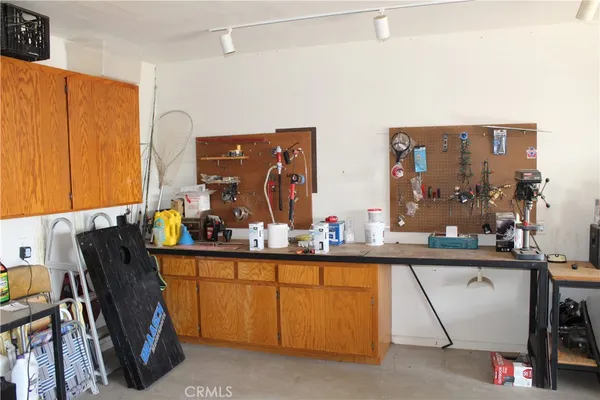 a view of living room with furniture and flat screen tv