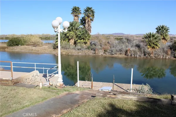 a house view with a lake view