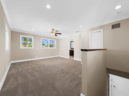 a view of empty room with windows