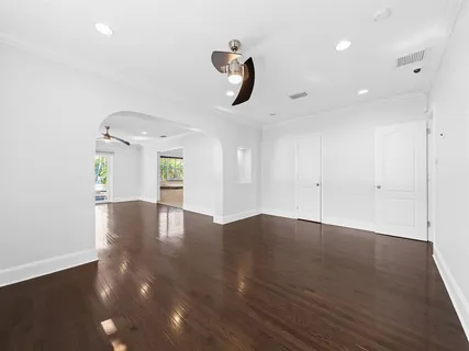 a view of an entryway with wooden floor