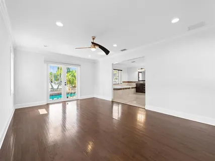 a view of a kitchen with a sink and a window