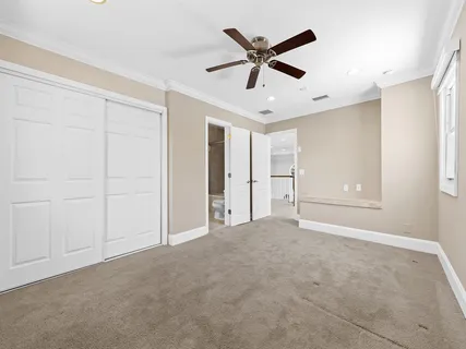 a bathroom with a granite countertop sink mirror and a bathtub